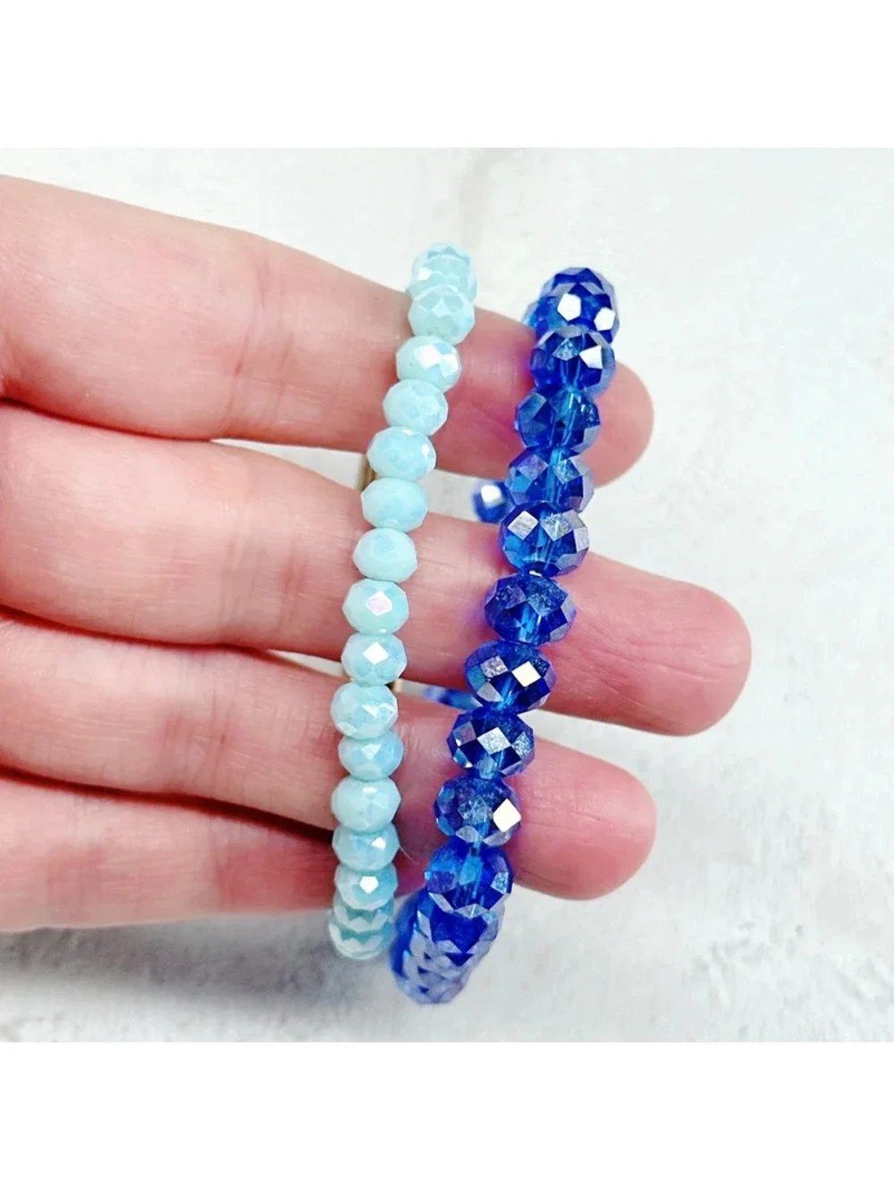 337u. Blue Stretch Glass Bracelets
